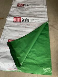 BodySealer Bio Containment Body Bag, partially open. Three ply material with metal foil barrier. Heat seal to hermetically close.